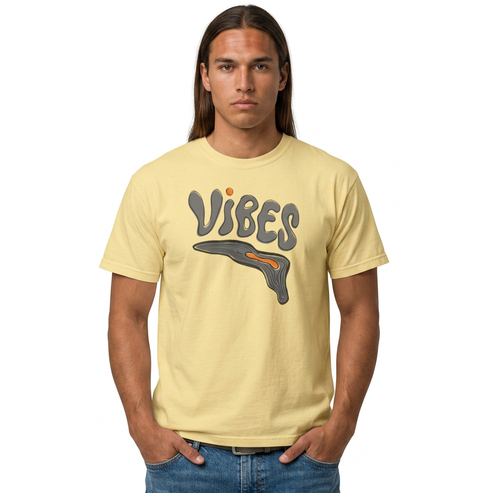 Man wearing a yellow t-shirt with 'VIBES' graphic design on a white background