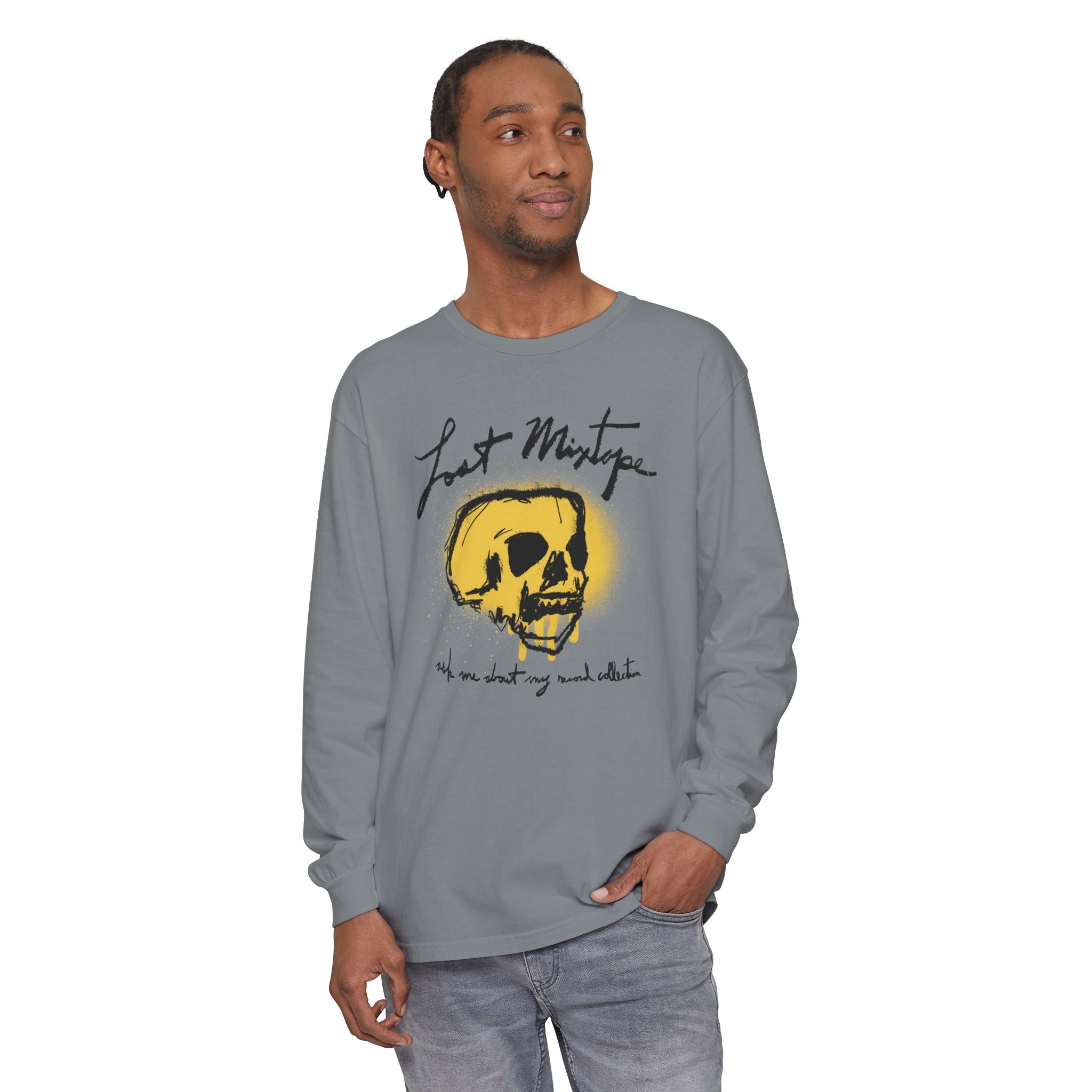 Man wearing a gray long-sleeve shirt with a yellow skull design on a white background