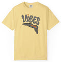 Yellow t-shirt with 'VIBES' and melting vinyl record