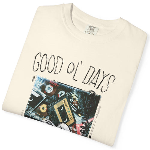 Folded t-shirt with 'Good Ol' Days' text and cassette tape graphic on a white background