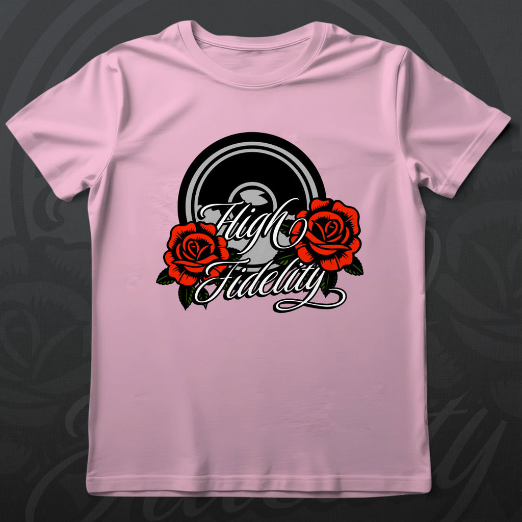 Pink t-shirt with 'High Fidelity' design featuring roses on a wooden surface
