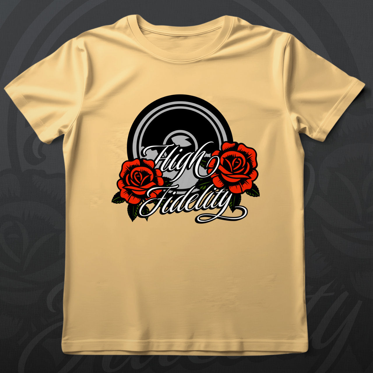 Yellow t-shirt with 'High Fidelity' design featuring roses on a wooden surface