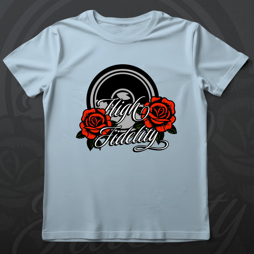 Light blue t-shirt with 'High Fidelity' design featuring roses on a wooden surface