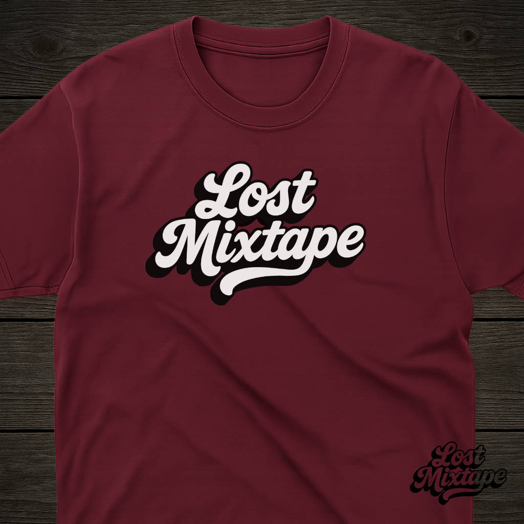 Maroon t-shirt with 'Lost Mixtape' text on a wooden surface