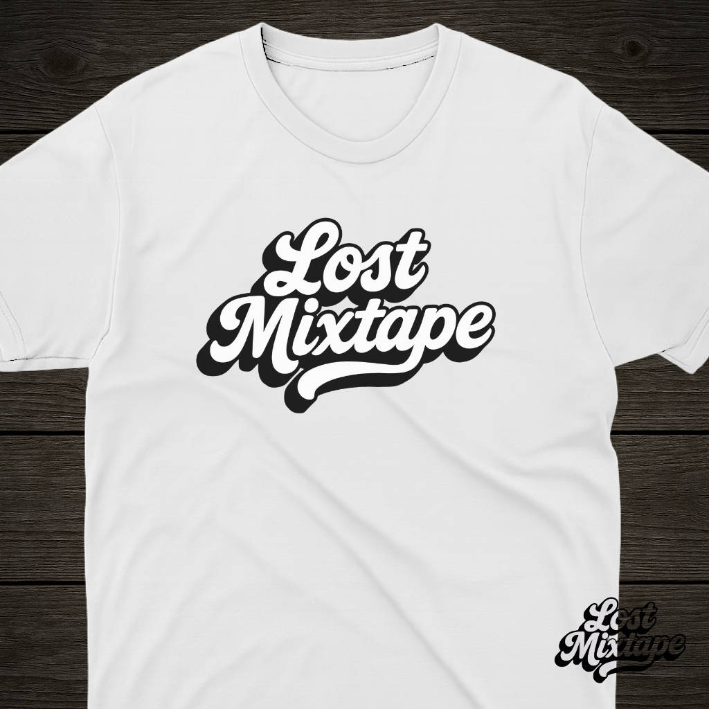 White t-shirt with 'Lost Mixtape' text on a wooden surface