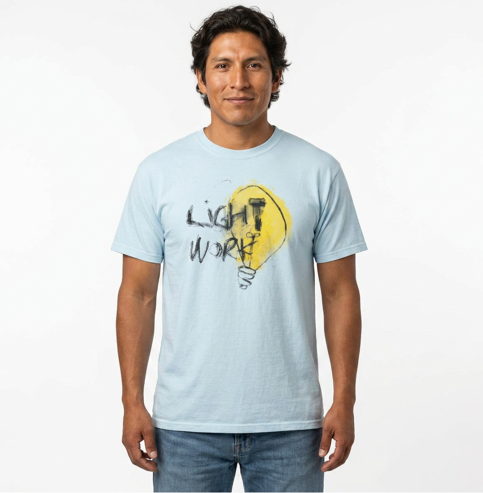 athletic hispanic adult male in a light blue t-shirt with an illustration of a light bulb and the words Light Work handwritten in a loose charcoal pencil style