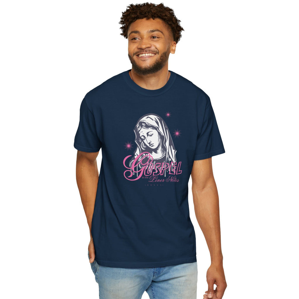 Man wearing a navy blue t-shirt with a graphic design on a white background