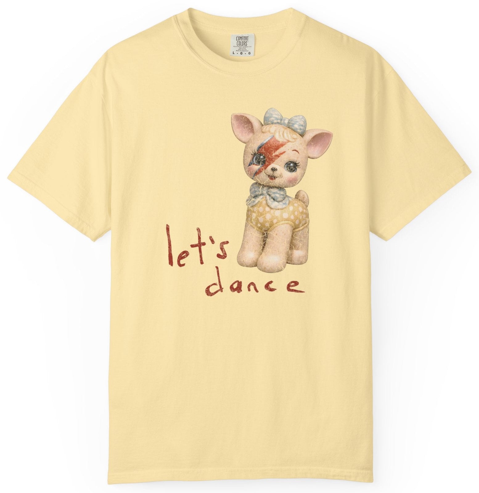 Yellow t-shirt with a dog illustration and 'let's dance' text on a white background